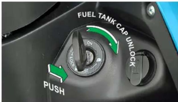 FUEL TANK CAP UNLOCK ON LOCK PUSH
