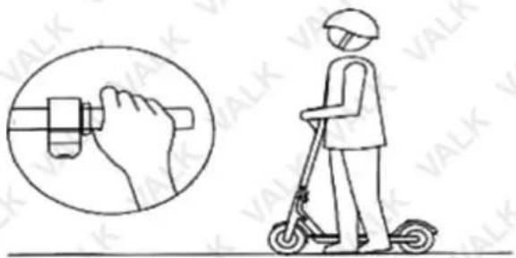 Diagram showing a person using a scooter with a hand operating a tool, alongside a magnified view of the hand holding a tool.