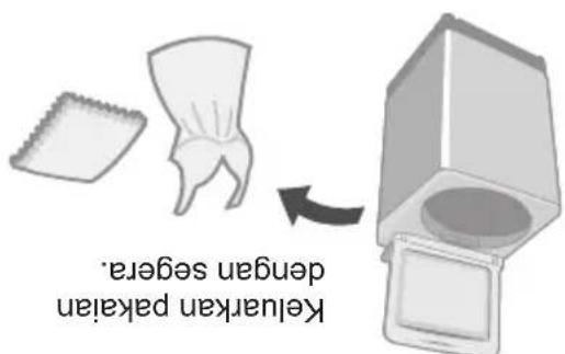Diagram showing two containers with particles and a cross symbol, likely indicating a chemical or experimental setup.