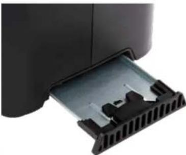 Close-up of a black electronic device with a plastic insert or connector inserted (no visible text or symbols)
