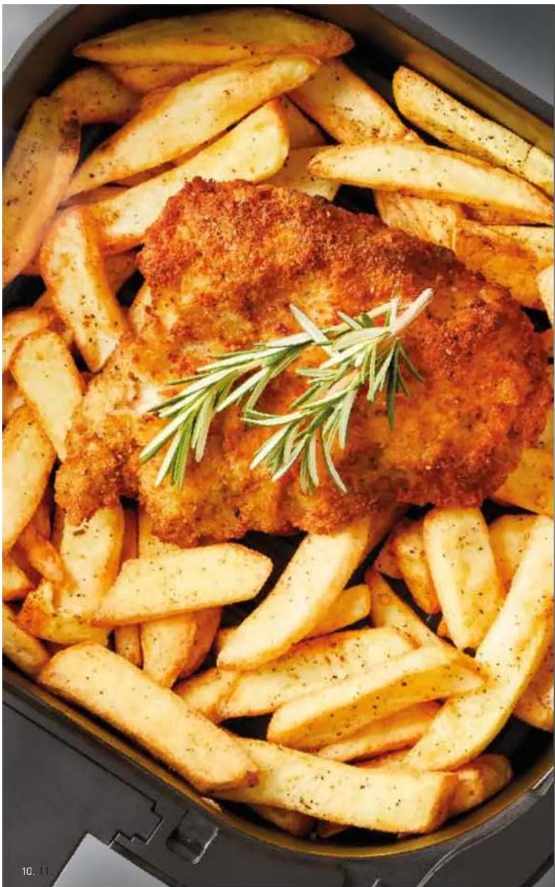 Close-up of a plated dish featuring golden-brown fried chicken pieces garnished with rosemary, served on a dark ceramic pot (no text or symbols visible).