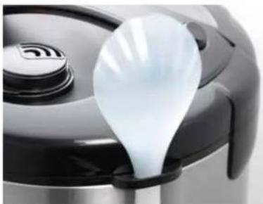 Close-up of a white plastic bulb inside a black kitchen pot (no text or symbols visible)