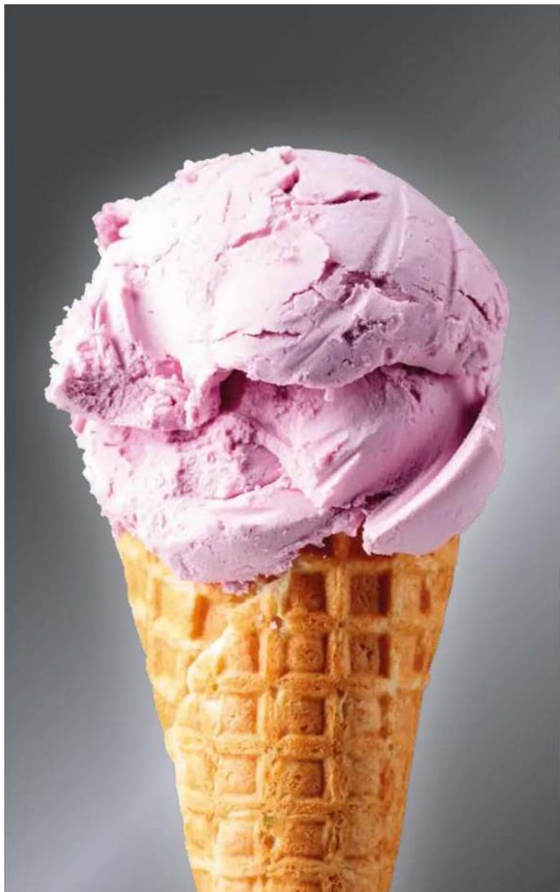 Close-up of a waffle cone covered with pink ice cream, no text or symbols visible