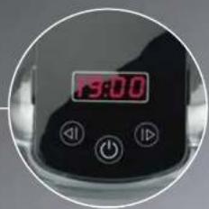 Close-up of a digital kitchen counter with a red timer showing 13:00 (no readable text or symbols beyond clock and buttons)