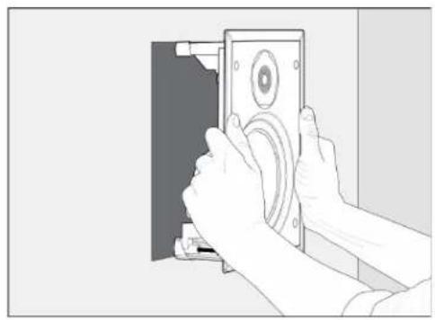 Illustration of hands operating a device with a circular component, no text or symbols visible