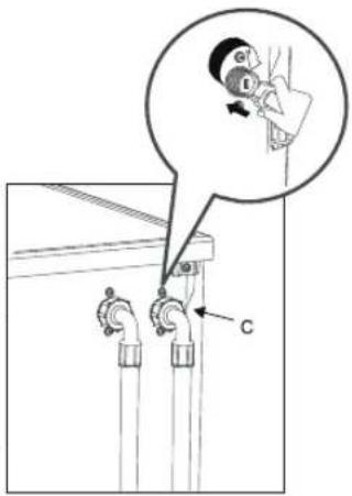 Diagram showing a person adjusting a wall-mounted pipe with a magnified inset highlighting the detail of the process.