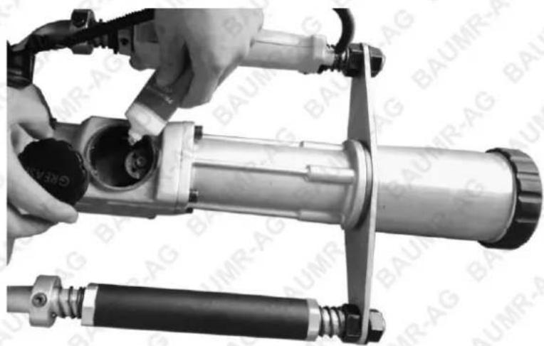 Baumr-AG HP420 - Filling of Impact Cylinder Lubrication - 1