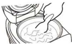 Zojirushi Micom NS-TSC18A - Loosen and level the surface of the rice that is being kept warm. - 1