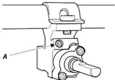 Mechanical assembly diagram showing a shaft and housing with mounting holes (no text or symbols)