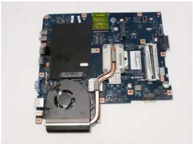 Top-down view of a computer motherboard with visible CPU socket, heatsink, and cooling fan (no text or symbols)