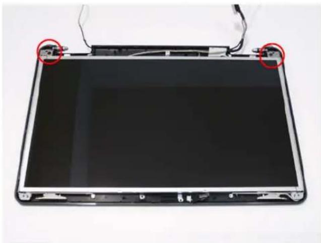 Top-down view of a black electronic device with two red-circled ports and cable connectors (no visible text or symbols).