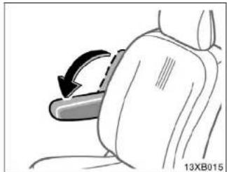 Diagram of a car seatbelt buckle being adjusted with a curved arrow indicating rotation (no text or symbols)