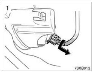 Diagram of a car interior showing a valve or connector with an arrow indicating direction (no text or symbols present)