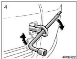 Mechanical diagram showing a bent pipe with directional arrows indicating motion (no text or symbols)