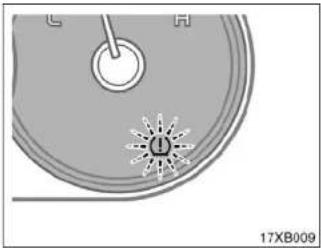 Diagram of a mechanical component with labeled parts and a starburst pattern (no readable text or symbols)