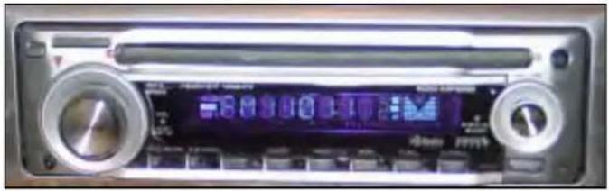 Front view of a CD-ROM drive with dual rotary knobs and a digital display (no visible text or symbols)