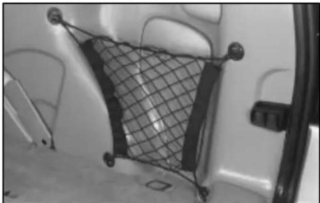 Interior view of a vehicle showing a mesh cushion and attached car seats (no visible text or symbols)