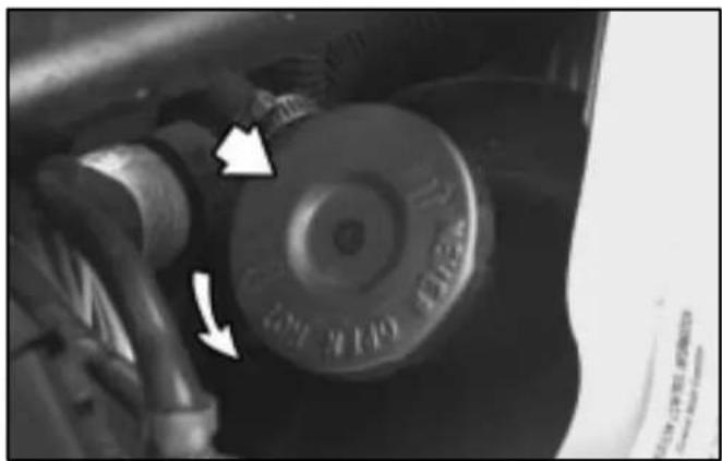 Close-up of a mechanical component with arrows indicating motion direction (no readable text or symbols)