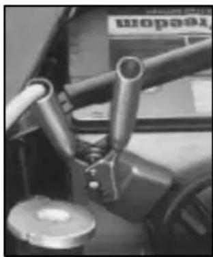 Close-up of a car's steering wheel and dashboard (no visible text or symbols)
