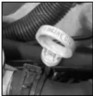 Close-up of a wrist strap with a metallic ring, partially visible against a textured background (no text or symbols)
