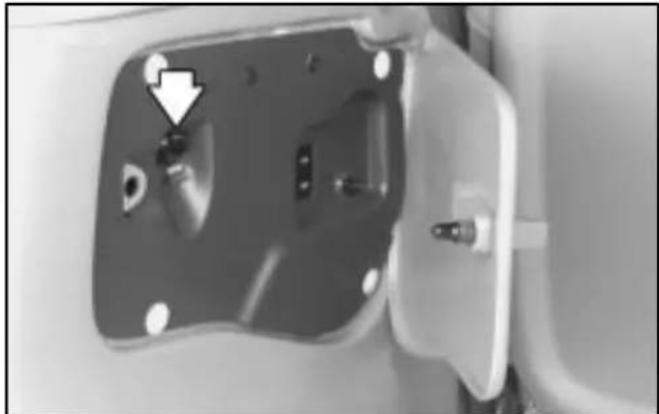 Close-up of a mechanical component with a highlighted section and arrow indicator (no visible text or symbols)