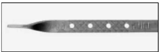 Close-up of a metallic tool tip with evenly spaced circular holes (no text or symbols visible)