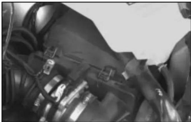 Close-up of mechanical components with visible springs and connectors (no text or symbols)