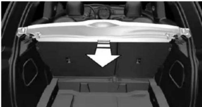 Interior view of a car showing a rear vent with a white arrow pointing to the backrest area (no text or symbols visible)