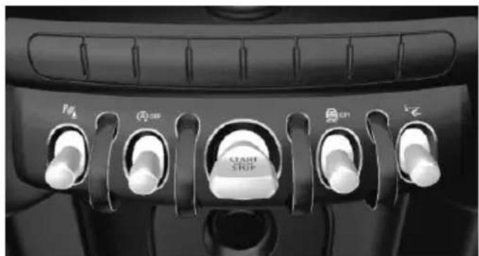 Close-up of a car front-mounted control panel with labeled buttons (no readable text beyond icons)