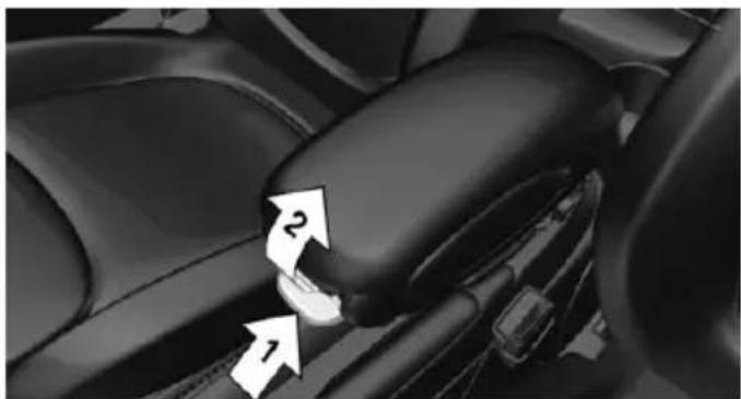 Close-up of a car seatbelt with two directional arrows indicating movement (no text or symbols)