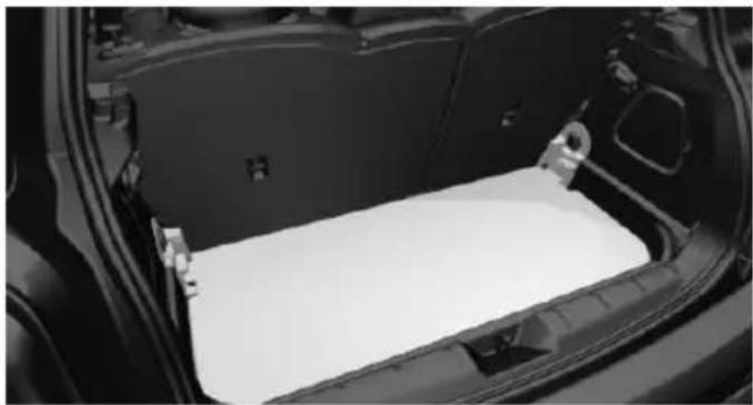 Interior view of a car showing the backrest area with plastic sheet inside (no text or symbols visible)