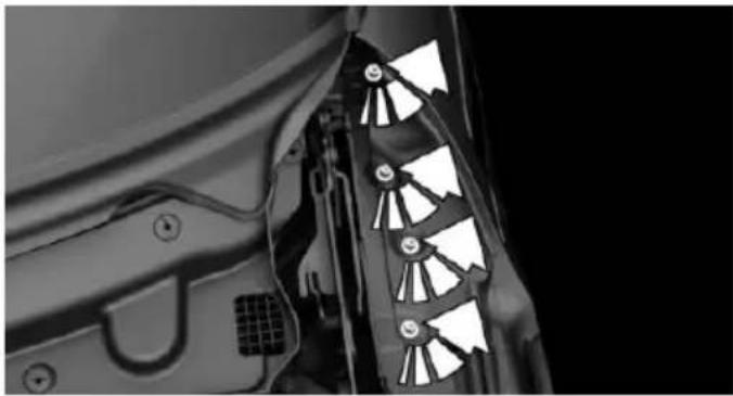 Close-up of a mechanical component with a gear-like structure and mounting bracket (no visible text or symbols)