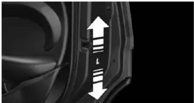 Close-up of a car wheel rim with white directional arrows indicating movement or force (no text or symbols)