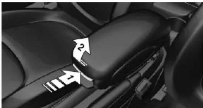 Close-up of a car's rear seat and dashboard with directional arrows indicating movement (no text or symbols)