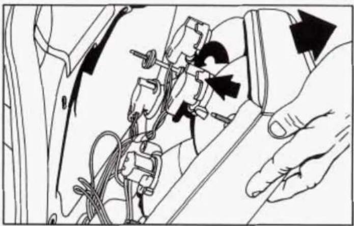 Technical line drawing of a car interior with hands and wiring, no visible text or symbols