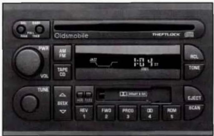 Oldsmobile THEFTLOCK PWR AM FMR 1:04 TAPE CO FAM1 RCL TONE TUNE SEEK DO DOWE EEO REV 1 FWG 2 PROG 3 DO 4 ROM 5 EJECT SCAN