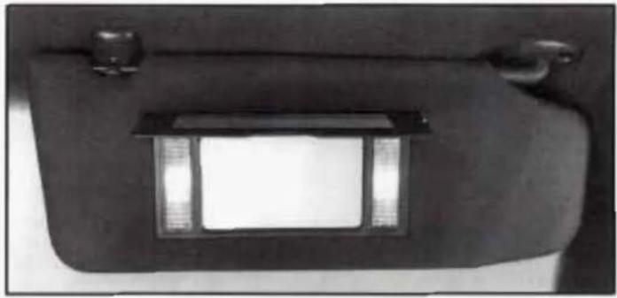 Interior view of a dark, curved room with a rectangular recess and two small fixtures on top (no visible text or symbols)
