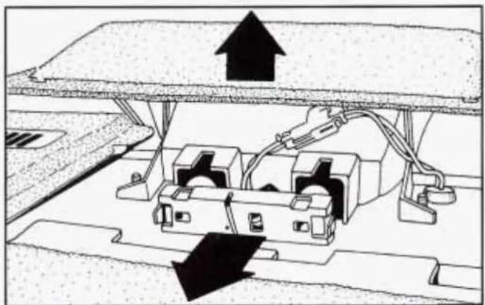 Diagram of an electrical circuit with components and directional arrows, no readable text or symbols present