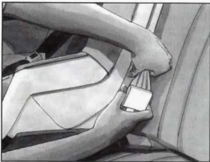 Interior view of a car seatbelt mechanism (no text or symbols visible)