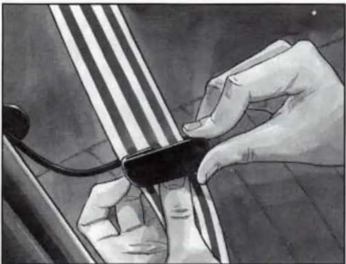 Illustration of a hand inserting a small black object into a car's seat (no text or symbols visible)