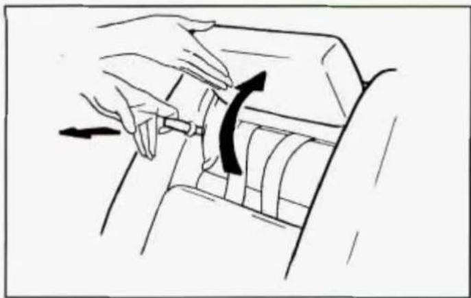 Illustration of hands using a tool to adjust or install a curved mechanical component (no text or symbols visible)