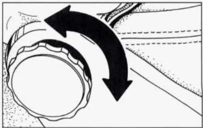 Diagram showing a rotating mechanical component with directional arrows indicating motion (no text or symbols)