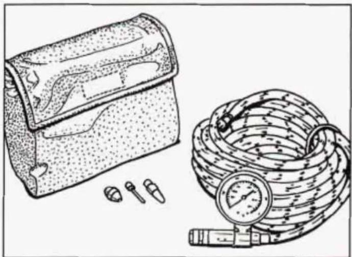 Illustration of a medical or laboratory device with a bag, coiled tubing, and pressure gauge (no text or symbols)