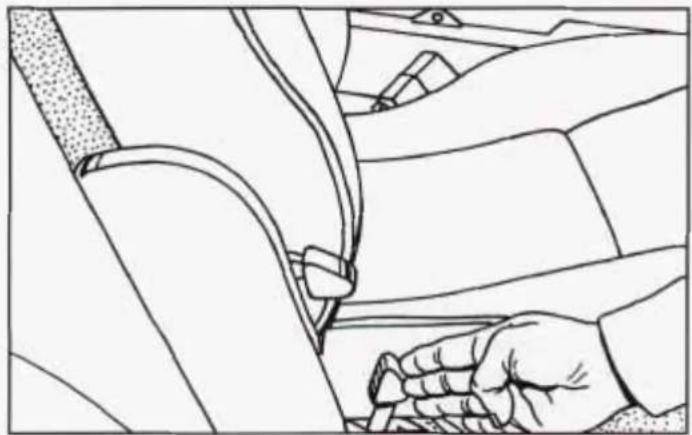Line drawing of a car seatbelt mechanism (no text or symbols)
