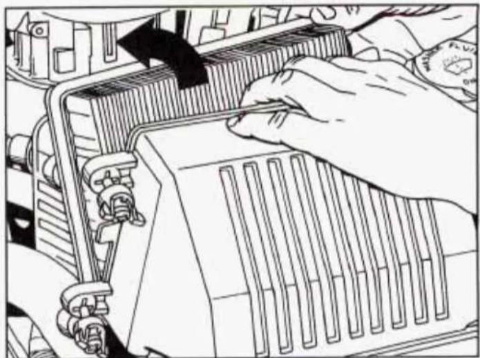 Illustration of hands operating a mechanical device with a handle and lock mechanism (no text or symbols visible)