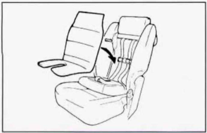 Line drawing of a car seat assembly with a belt and seatbelt, showing no text or symbols