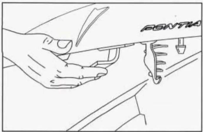 Line drawing of a hand holding a car's seatbelt with a wrench and screwdriver (no text or symbols)