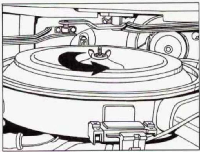 Technical line drawing of a mechanical assembly with a central rotating component and surrounding components (no text or symbols)