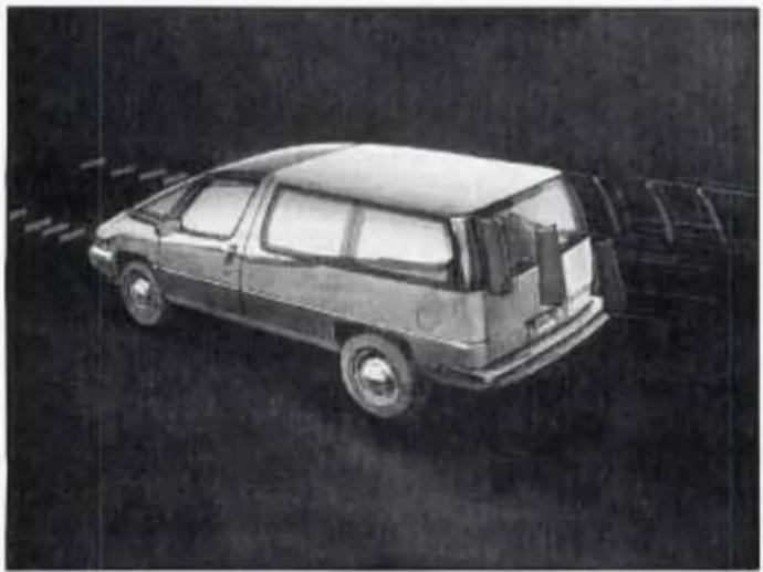 Side view of a vintage car with open trunk and side rear window, parked in snowy conditions (no visible text or symbols)