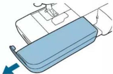 BABY LOCK Grace BL40A - Pull the flat bed attachment off to the left. - 1
